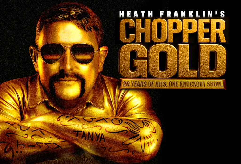 Gold-coloured man with a handlebar moustache and sunglasses, arms crossed with black ink tattoos. Large metallic gold 3D text reads HEATH FRANKLIN'S CHOPPER GOLD on a black background.