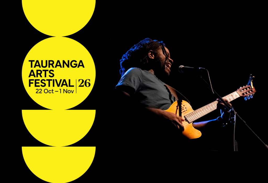 Stacked yellow circles on black background. Signage reads Tauranga Arts Festival 22 Oct–1 Nov. Man with dreadlocks plays guitar and sings into a microphone under warm stage lighting.